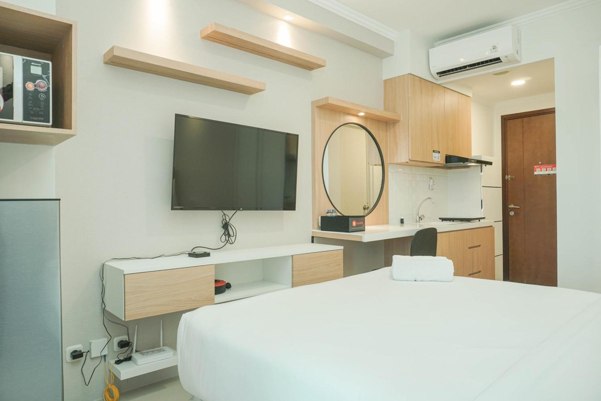 Well Appointed Signature Park Grande By Travelio Jakarta