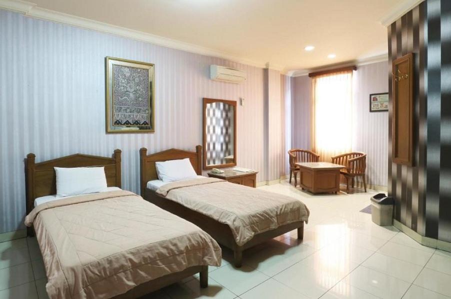 678 Kemang Powered By Cocotel Hotel