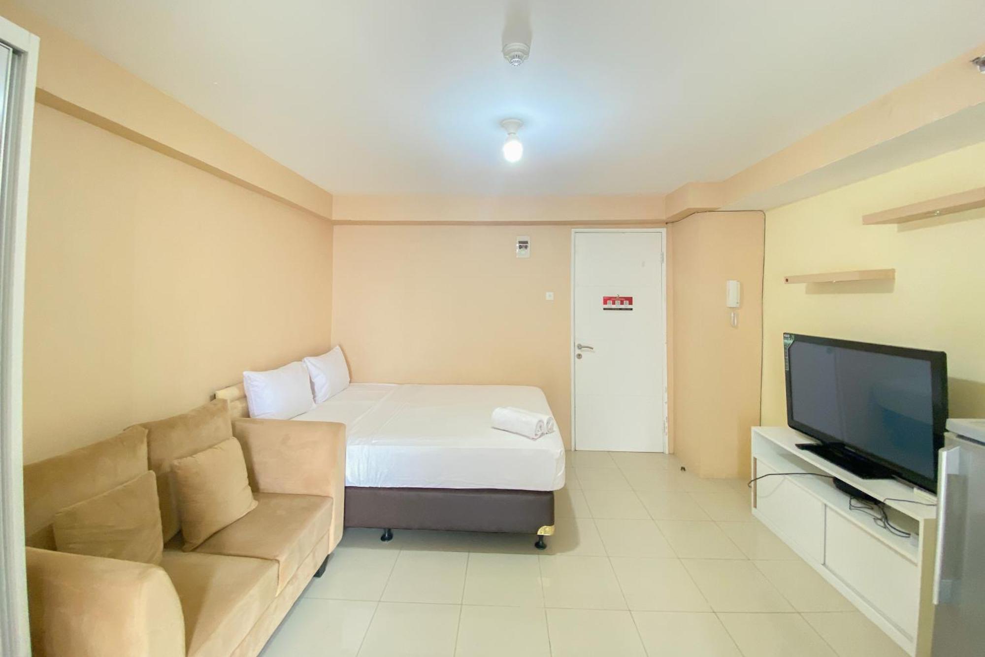 Apartment Cozy At 30th Floor Bassura By Travelio *