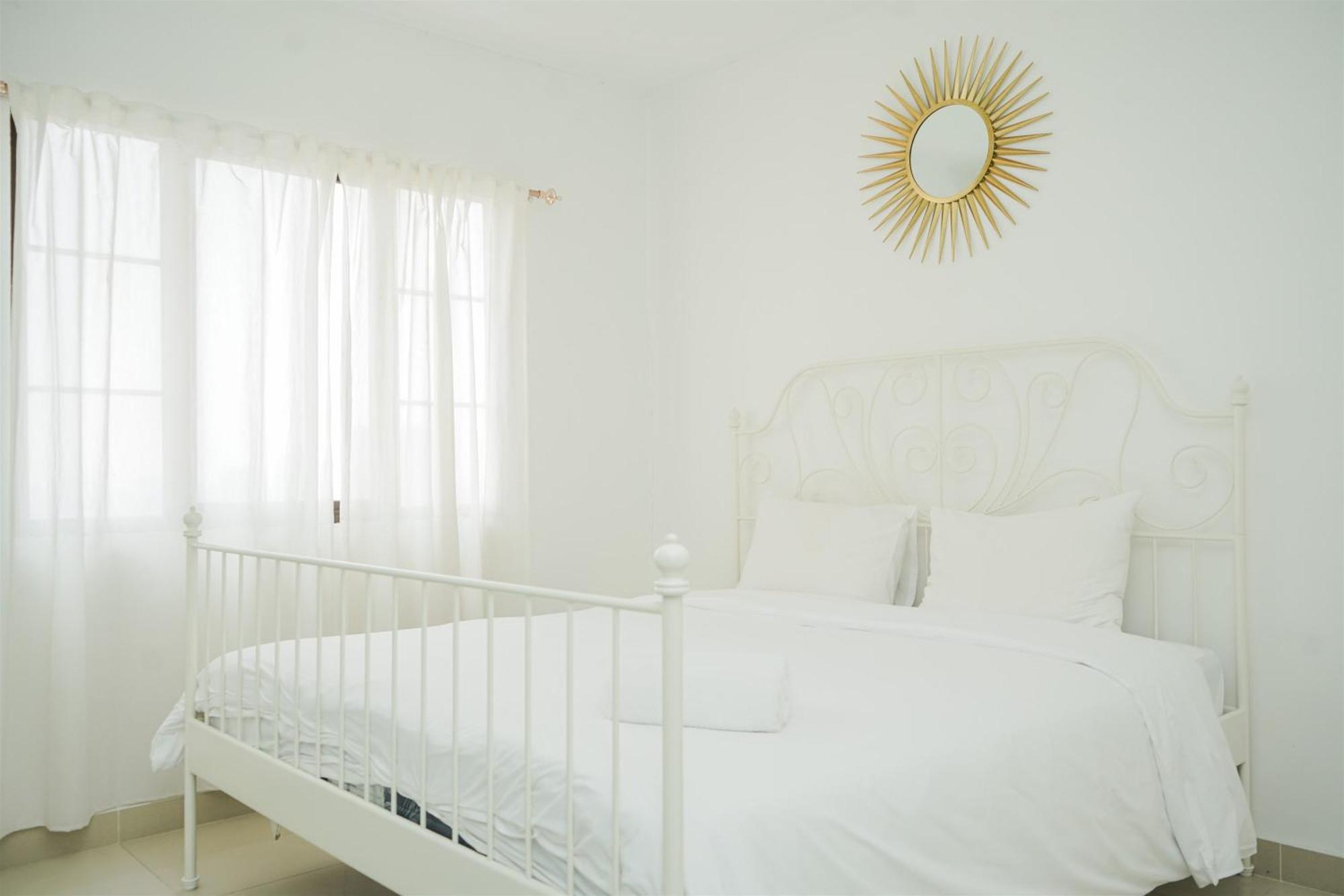 Strategic And Homey 2br At Puri Garden Near Mall By Travelio * Jakarta