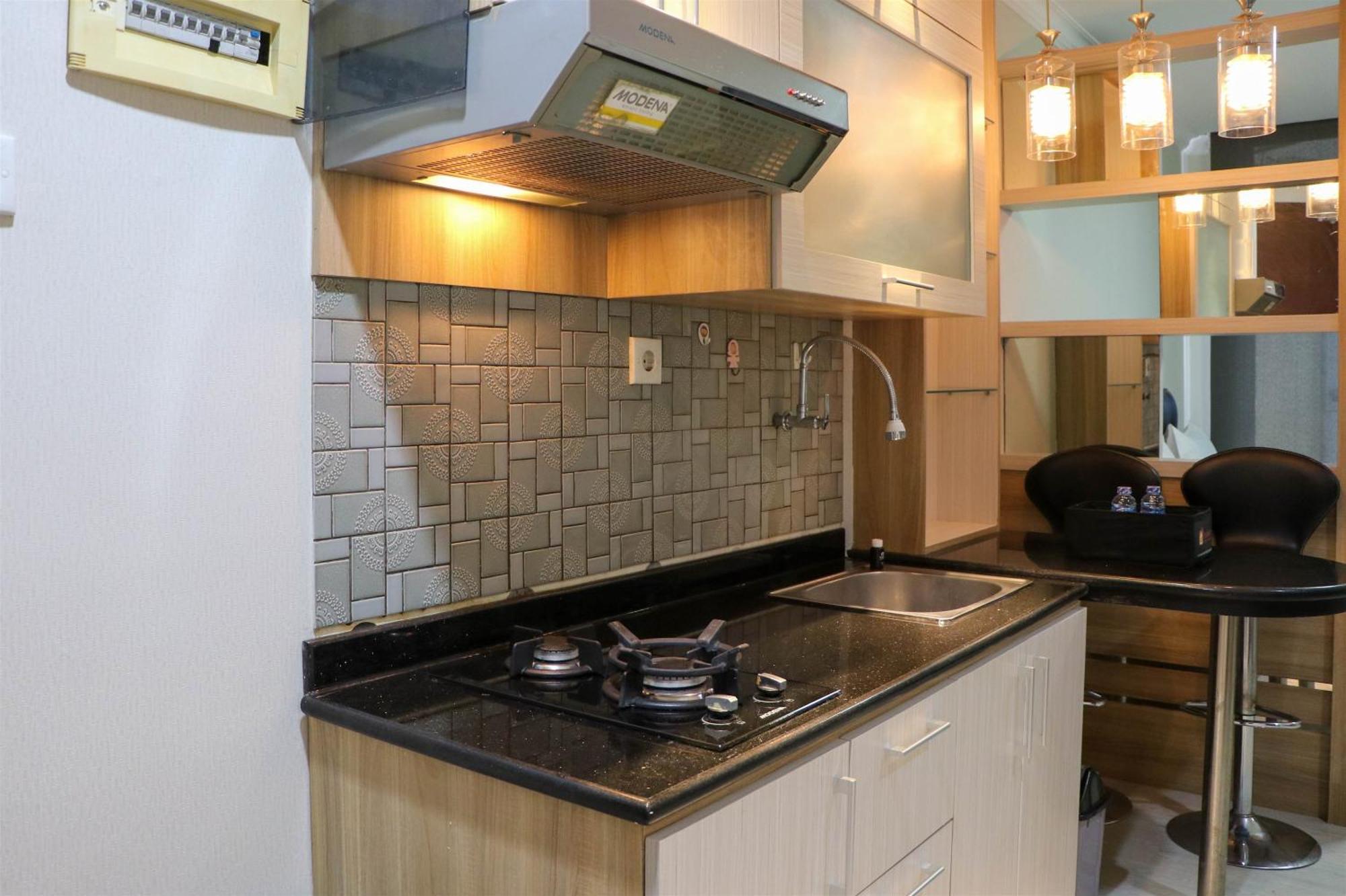 Cozy At Mangga Dua By Travelio *