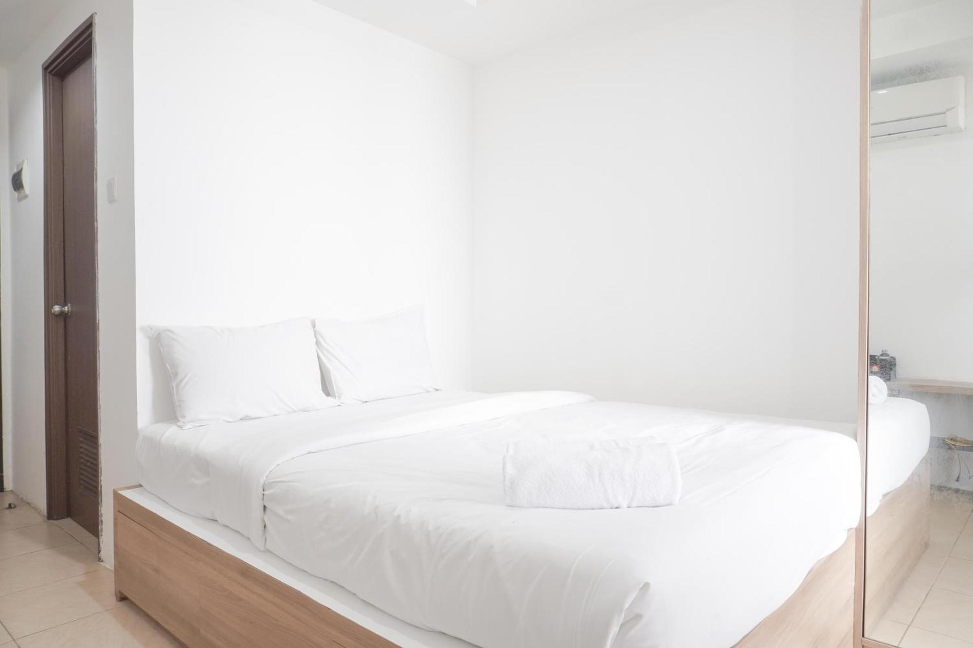 Apartment Minimalist And Comfort At Belmont Puri By Travelio Jakarta