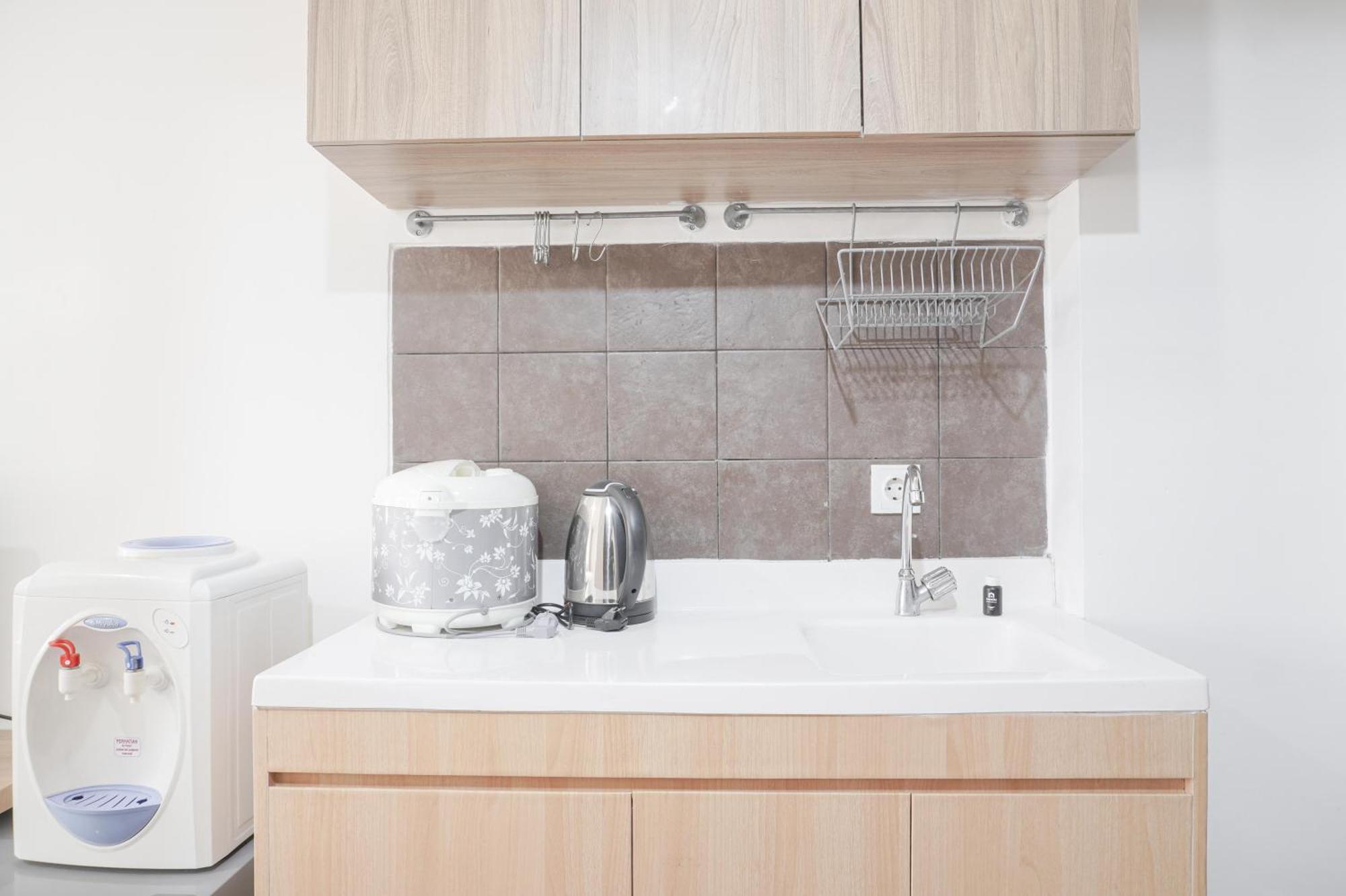 Minimalist And Comfort At Belmont Puri By Travelio Apartment Jakarta