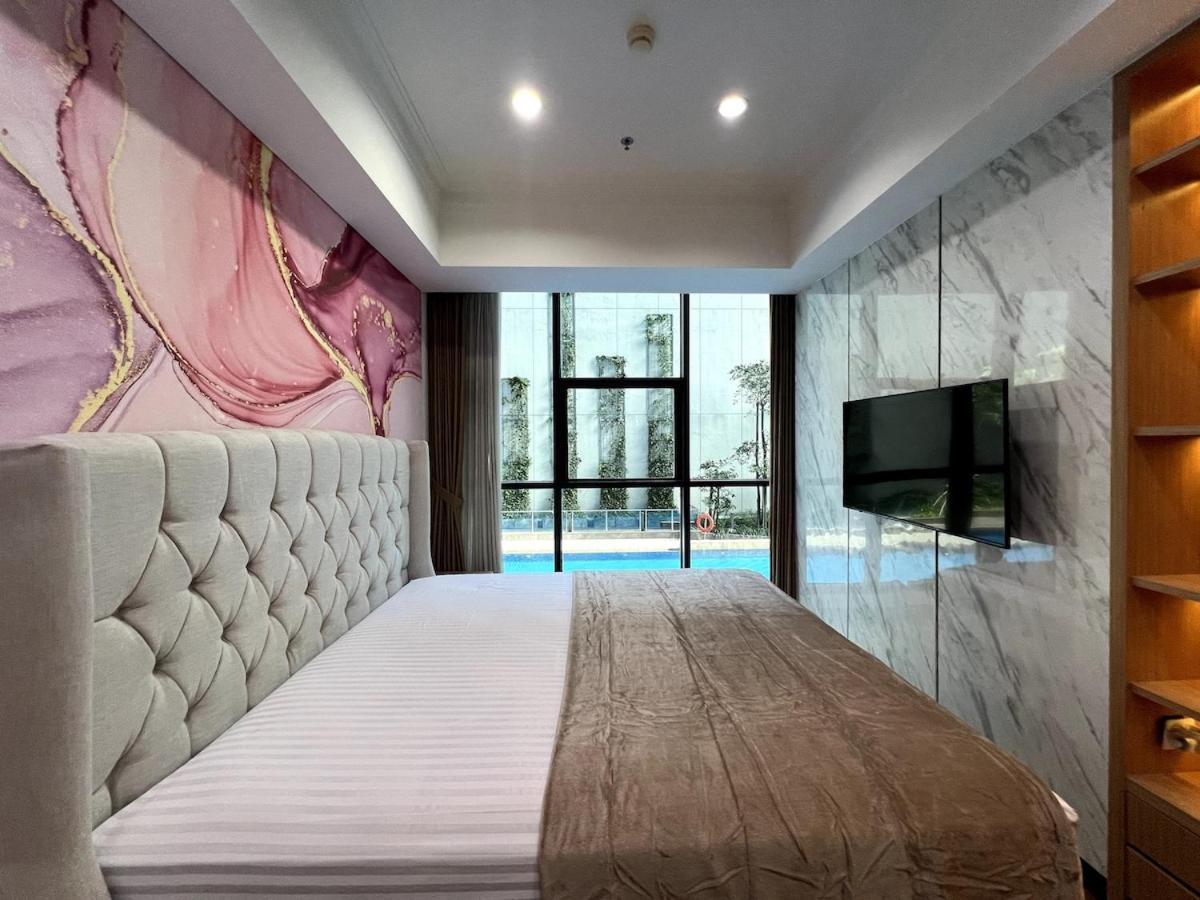 2 Bed Casa Grande Mall Kota Kasablanka, View Swimming Pool By Travelibu *
