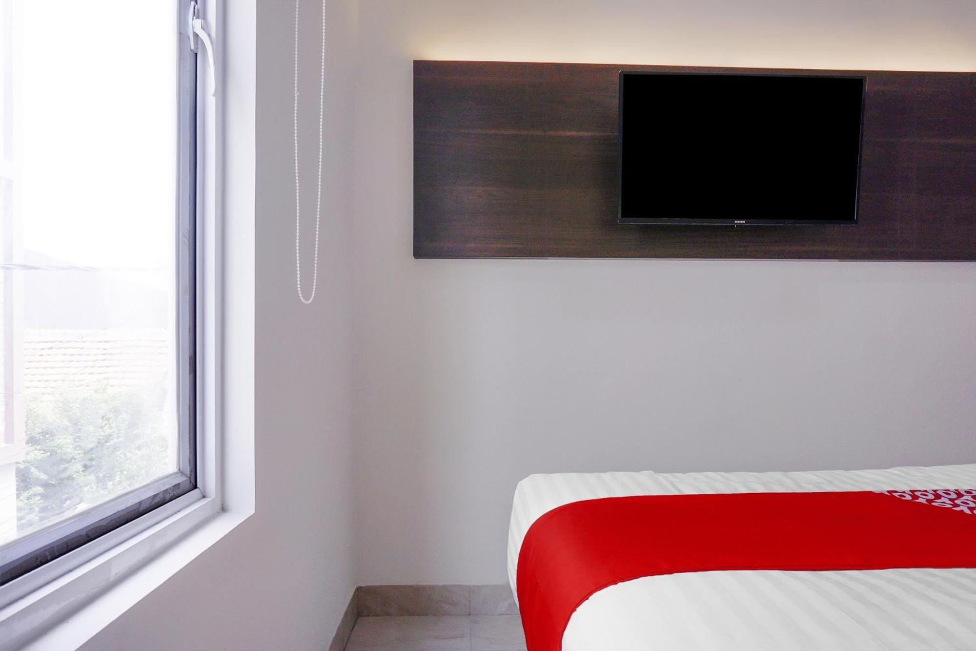 Hotel Super Oyo 93287 Pioneer Pasar Baru Jakarta