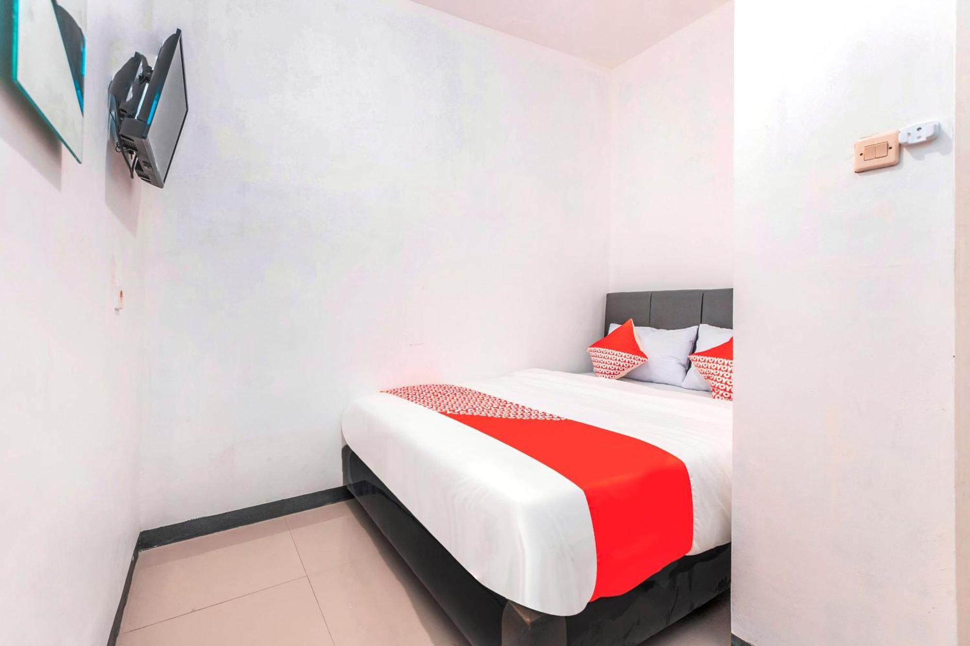 Super Oyo 2223 J&b Utan Kayu Khách sạn
