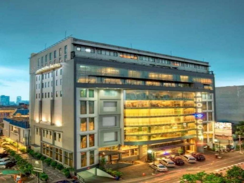 Amos Cozy Melawai Hotel