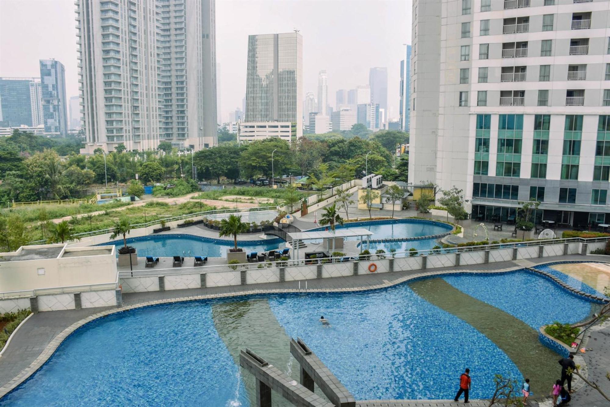 Apartment And Homey 1br At The Wave Kuningan By Travelio