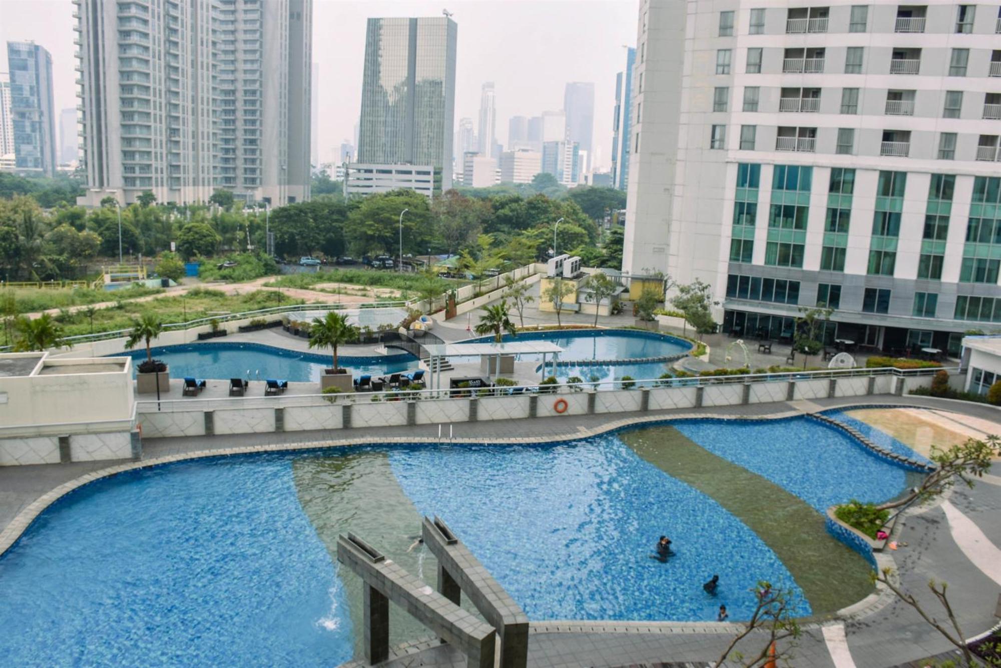 Apartment And Homey 1br At The Wave Kuningan By Travelio