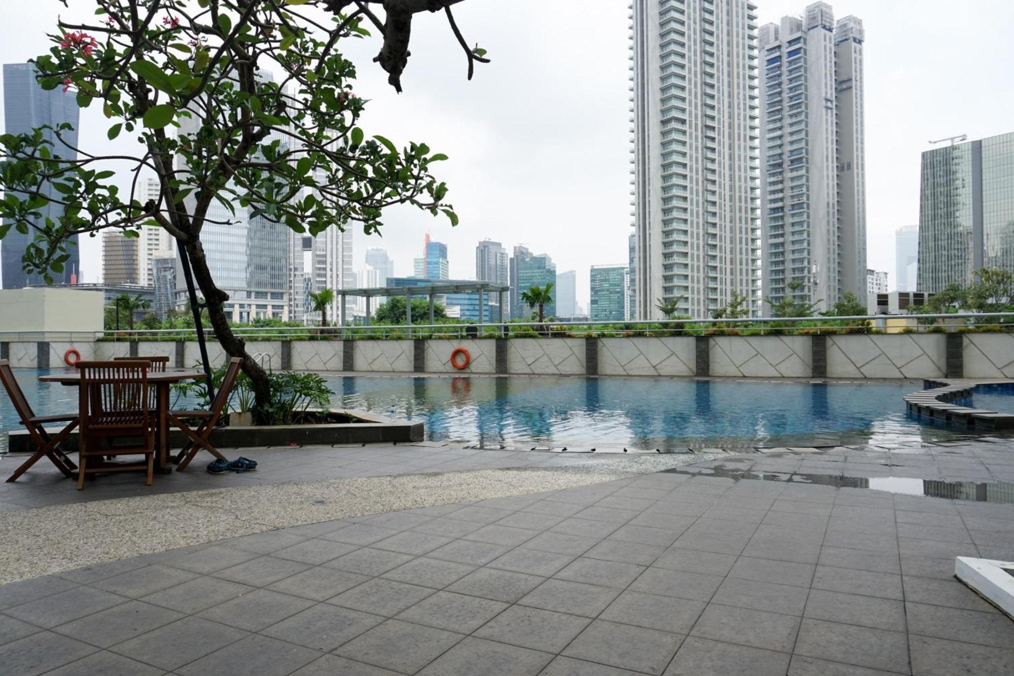 And Homey 1br At The Wave Kuningan By Travelio Apartment