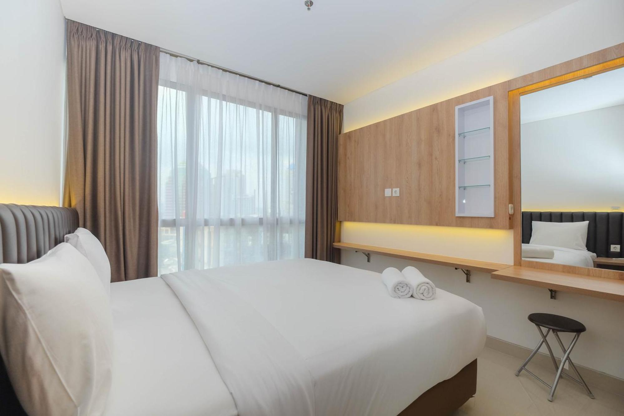Apartment Minimalist And Homey 1br At Ciputra World 2 By Travelio Jakarta