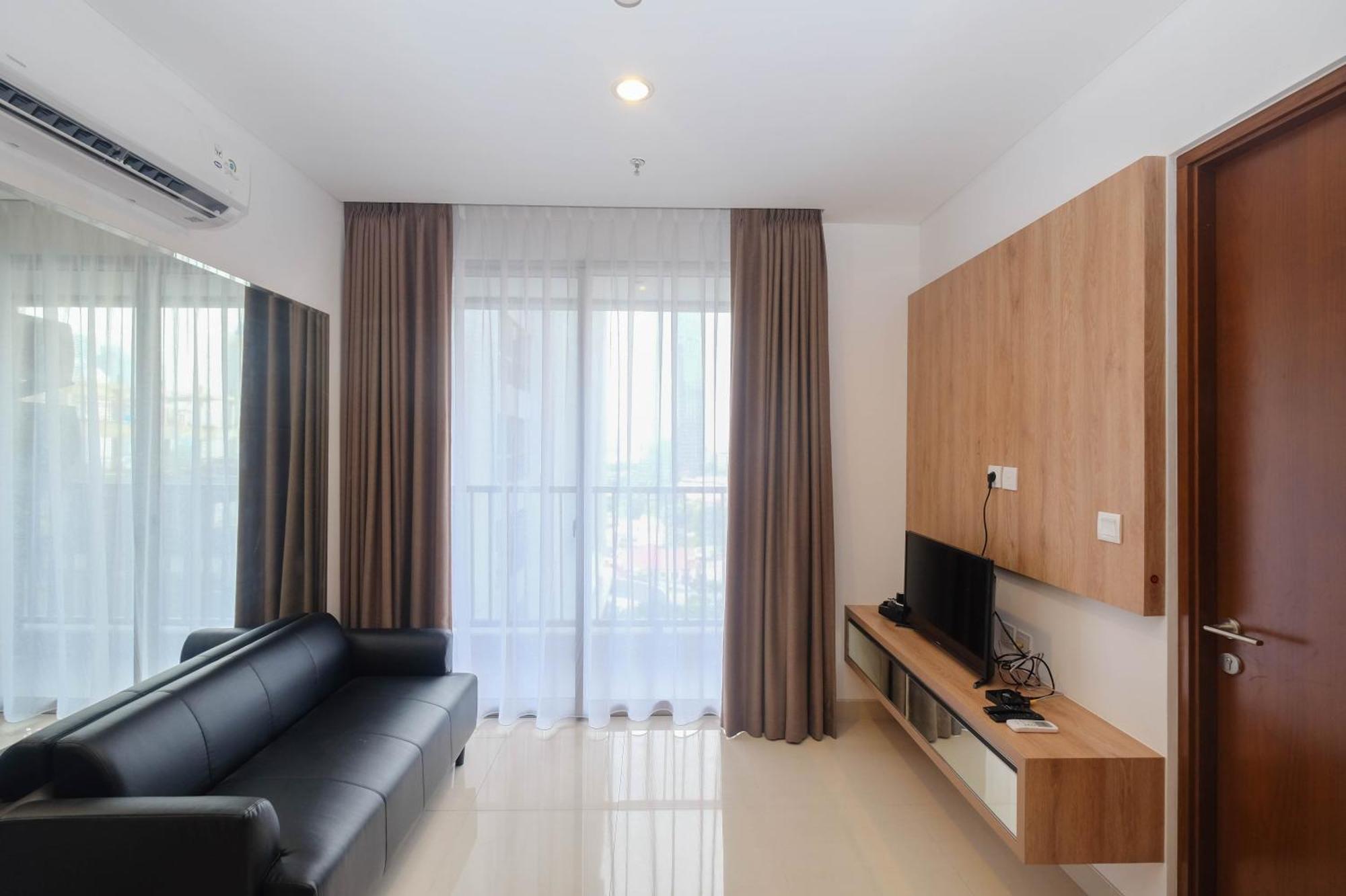 Apartment Minimalist And Homey 1br At Ciputra World 2 By Travelio