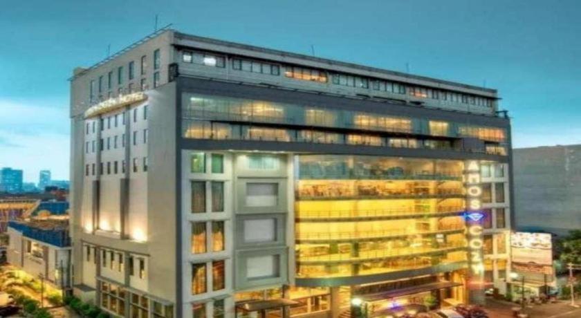 Amos Cozy Melawai Hotel 4*