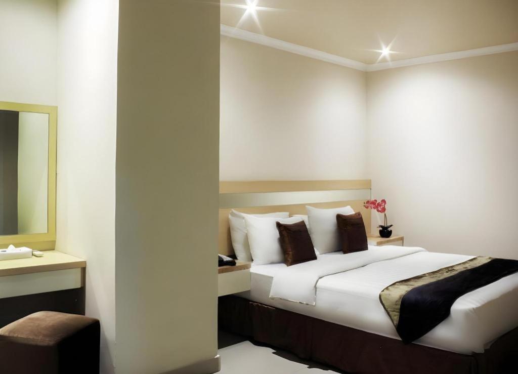 Hotel Amos Cozy Melawai 4*