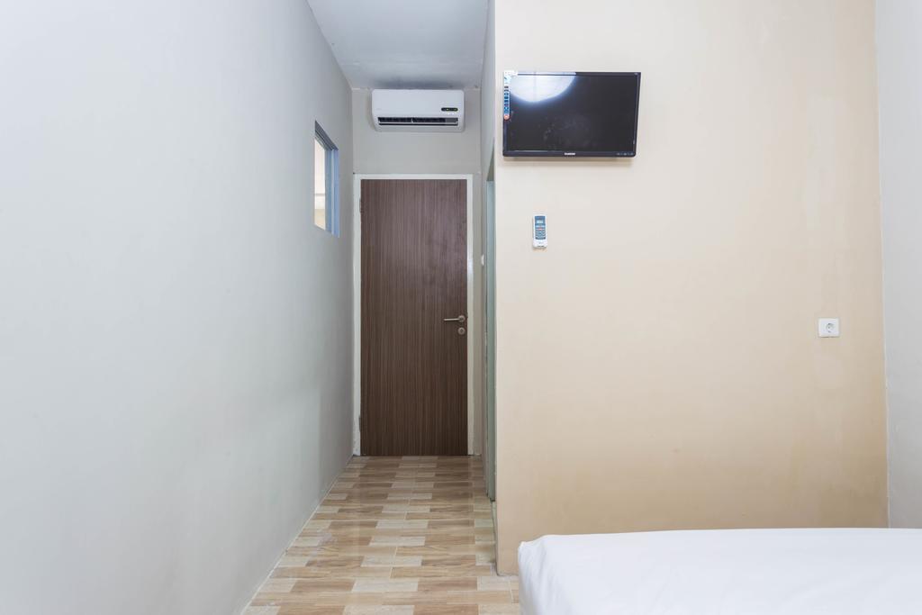 Guest house Reddoorz Near Saharjo