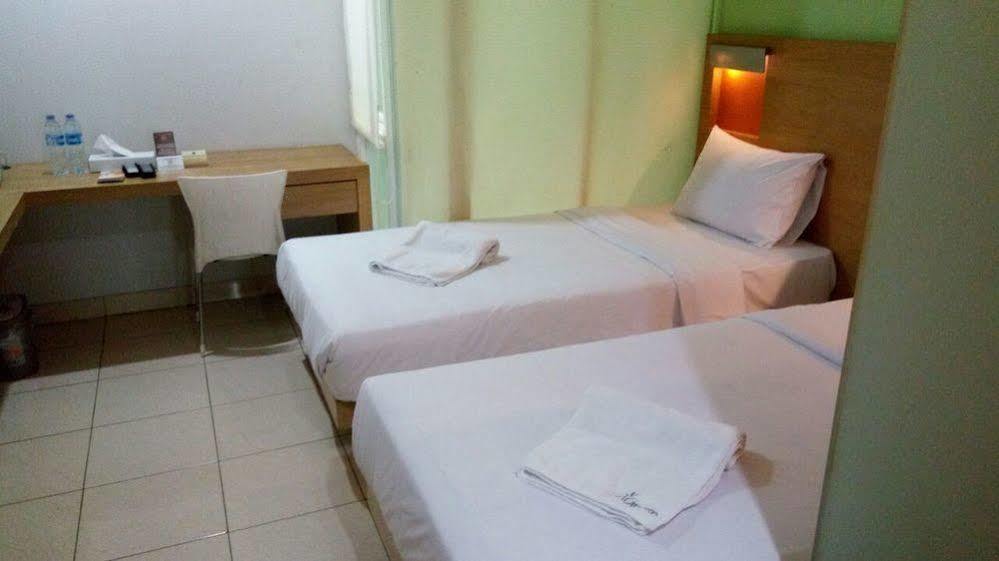 Legreen Poso Guest house *
