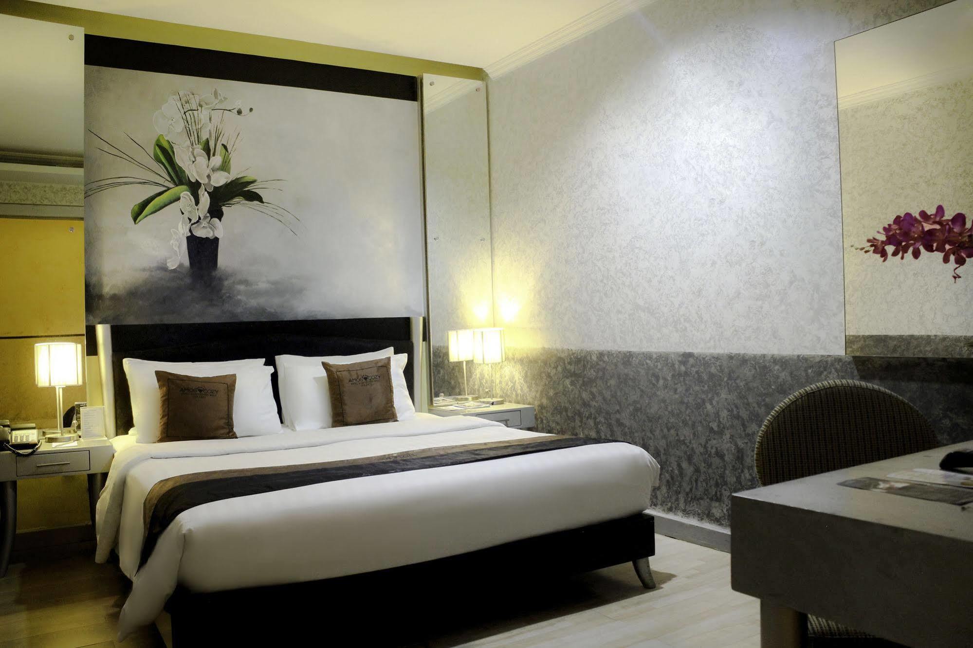 Amos Cozy Melawai Hotel