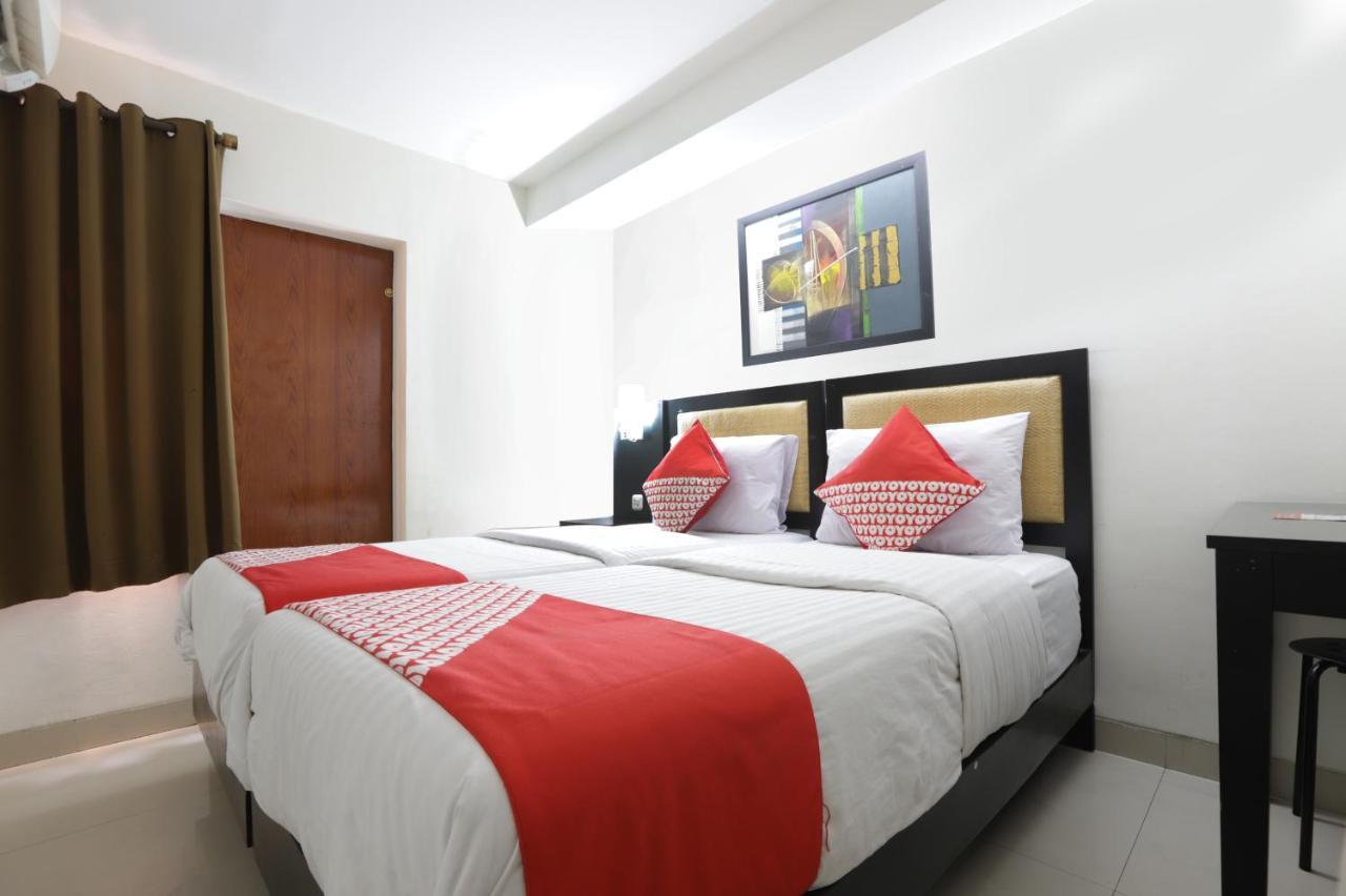 Oyo 161 Dc Utan Kayu Hotel