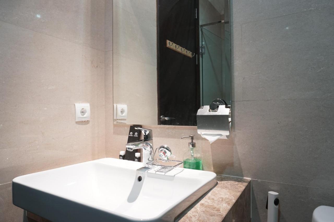 Apartment Cozy And Tranquil Menteng Park By Travelio