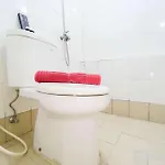Homey And Cozy Living 2Br At Bassura City Apartment By Travelio
