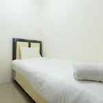 Comfortable 2Br Green Pramuka City Apartment By Travelio