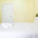 Minimalist Studio Green Pramuka City Apartment By Travelio