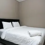 Best Location 2Br Ciputra International Apartment By Travelio