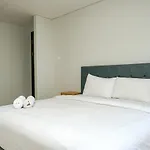 Cozy 2Br @ The Masterpiece Condominium Epicentrum Apartment By Travelio