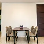 Cozy 2Br @ The Masterpiece Condominium Epicentrum Apartment By Travelio