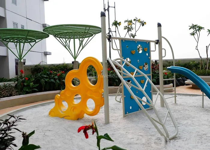 Luxurious 2Br Bassura City Apartment With Mall Access By Travelio