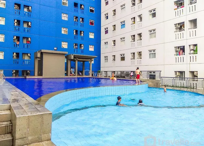 Minimalist Studio Green Pramuka City Apartment By Travelio