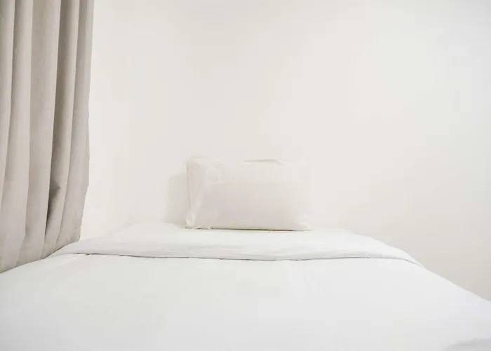 Modern And Homey 2Br At Mt Haryono Square Apartment By Travelio