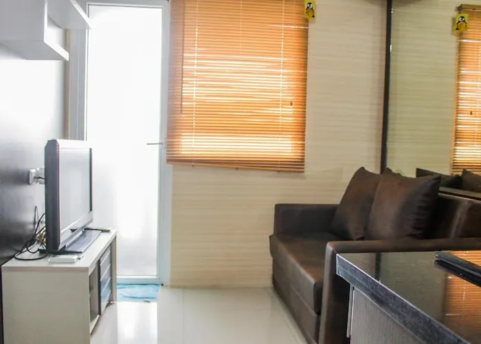Minimalist 2Br Green Pramuka City Apartment Near Shopping Mall By Travelio