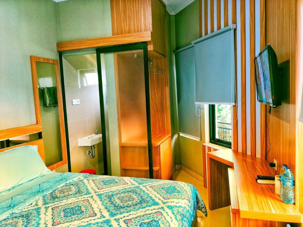 Cozy Tomang Hotel