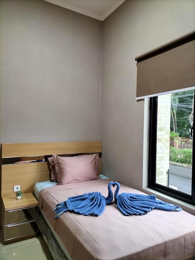 Hotel Cozy Tomang