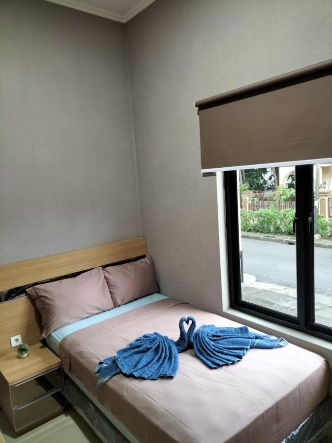 Cozy Tomang Hotel *