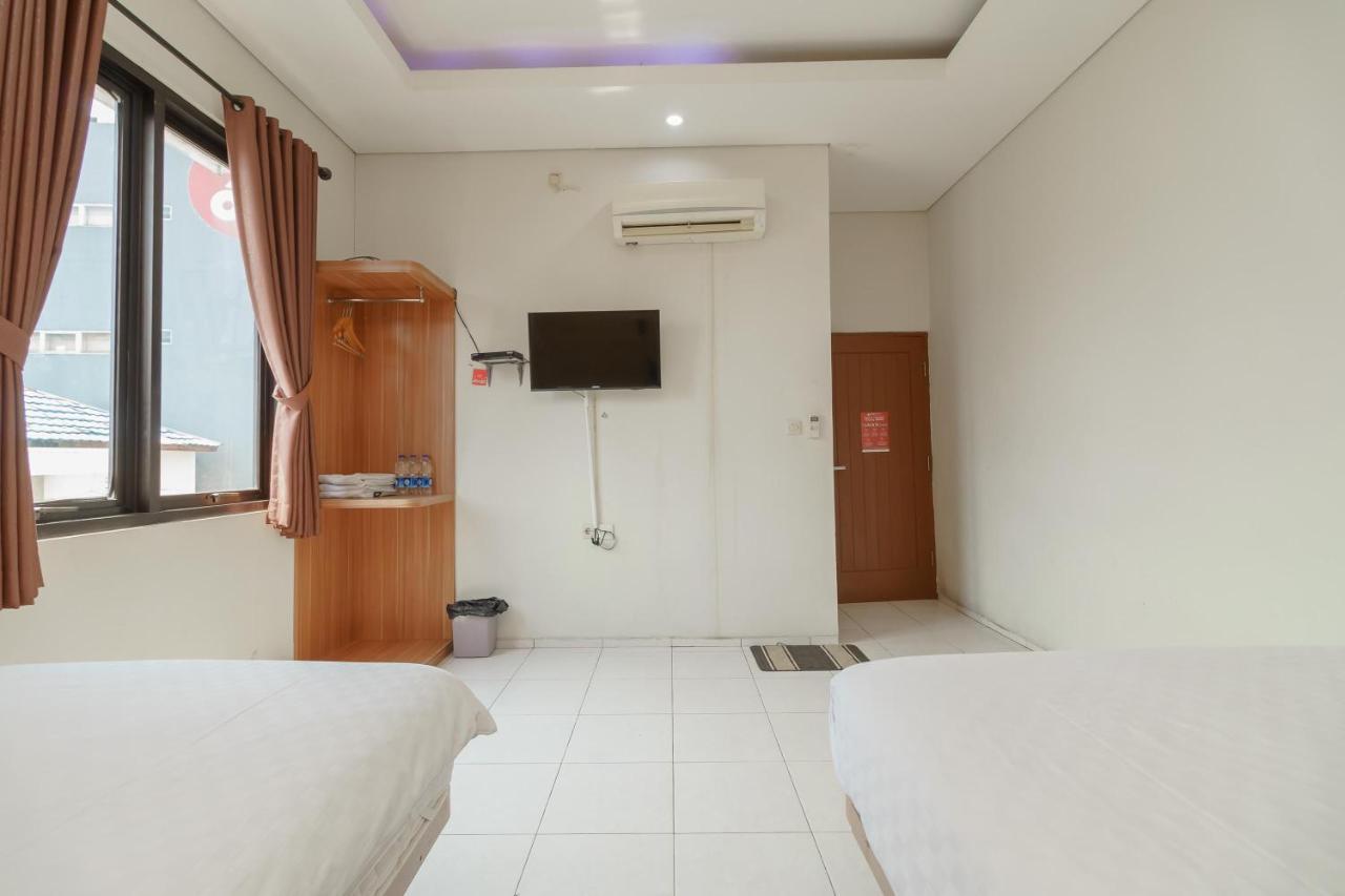 Apple Near Sarinah Mitra Reddoorz Wisma tamu Jakarta