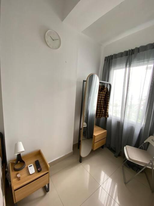 Apartment Minimalist At The Nest By Popobella Near Puri Indah West