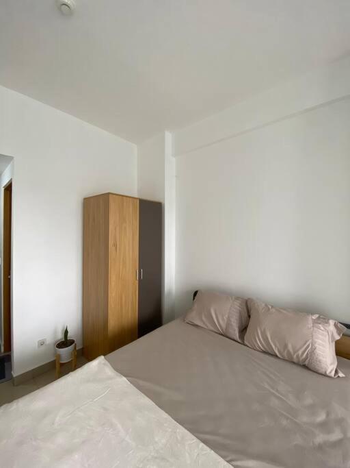 Minimalist At The Nest By Popobella Near Puri Indah West