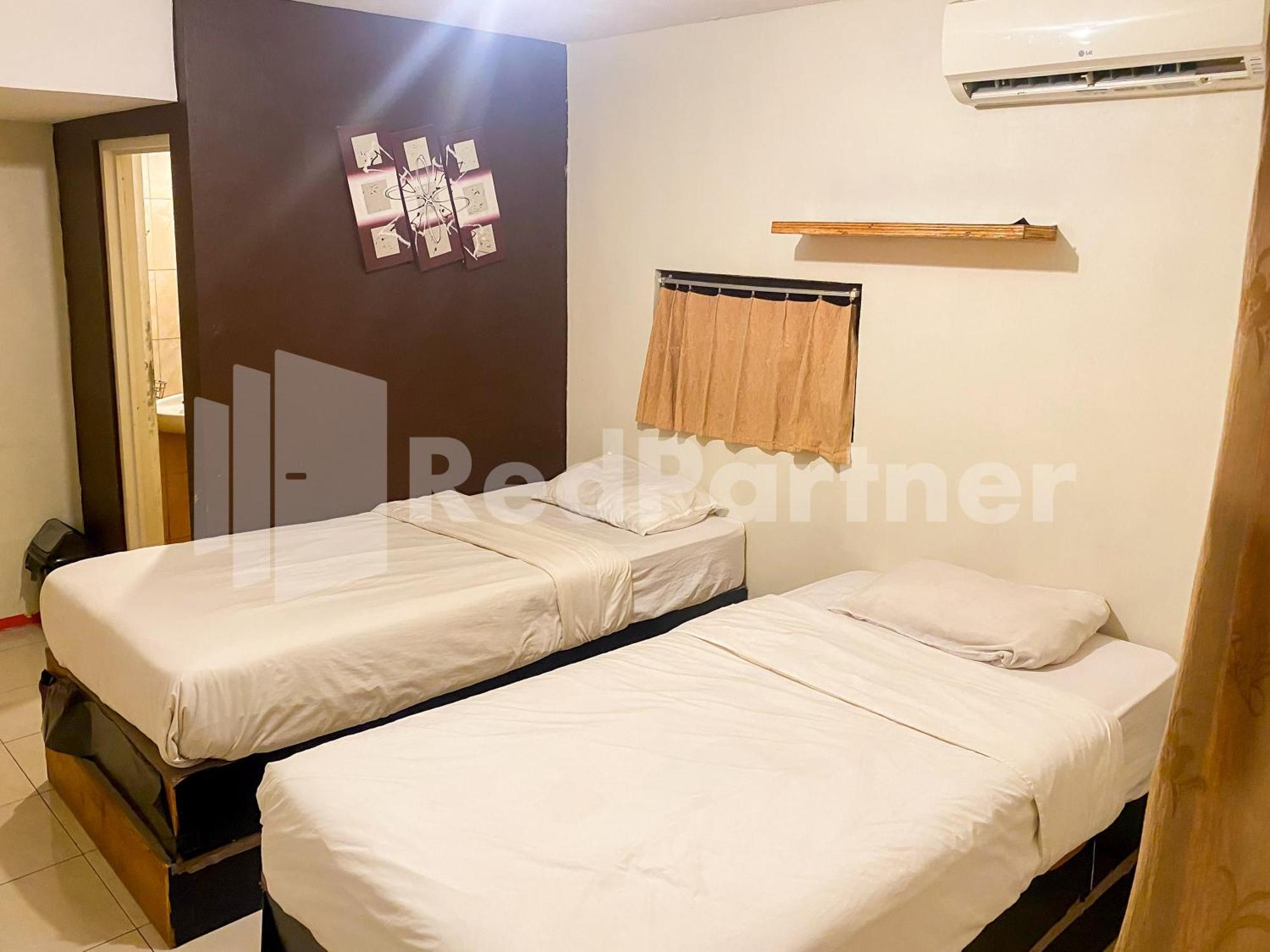 Audah Syariah Kuningan Redpartner Hotel 2*
