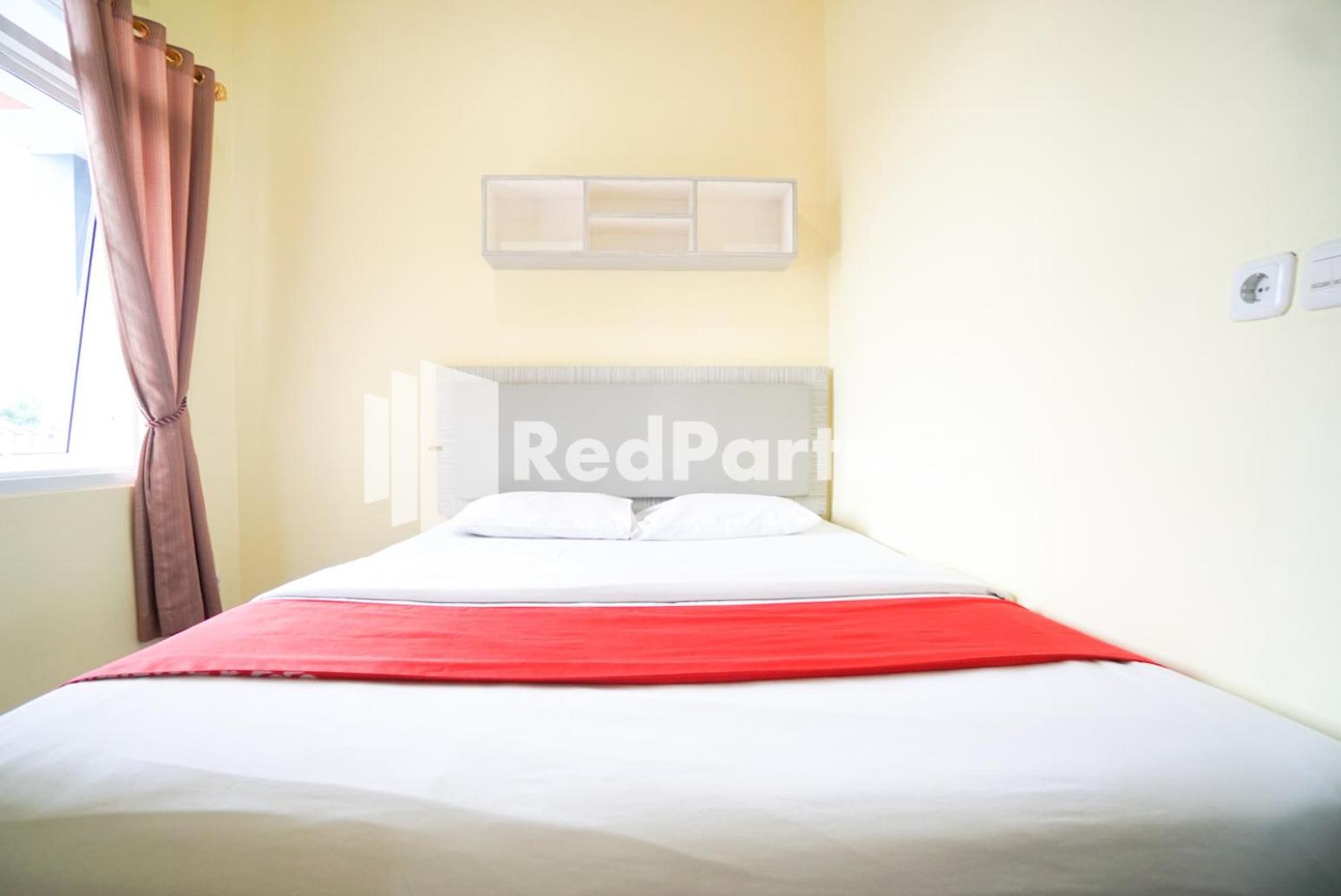 Hotel Indah Syariah Mitra Reddoorz Jakarta