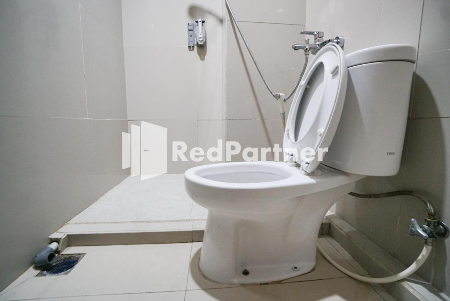 Hotel Indah Syariah Mitra Reddoorz 2*