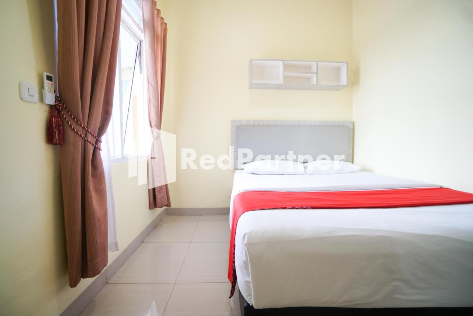 Indah Syariah Mitra Reddoorz Hotel