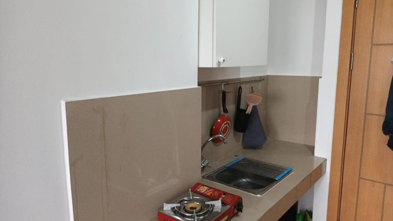 Apartment Minimalist At The Nest By Popobella Near Puri Indah West Jakarta