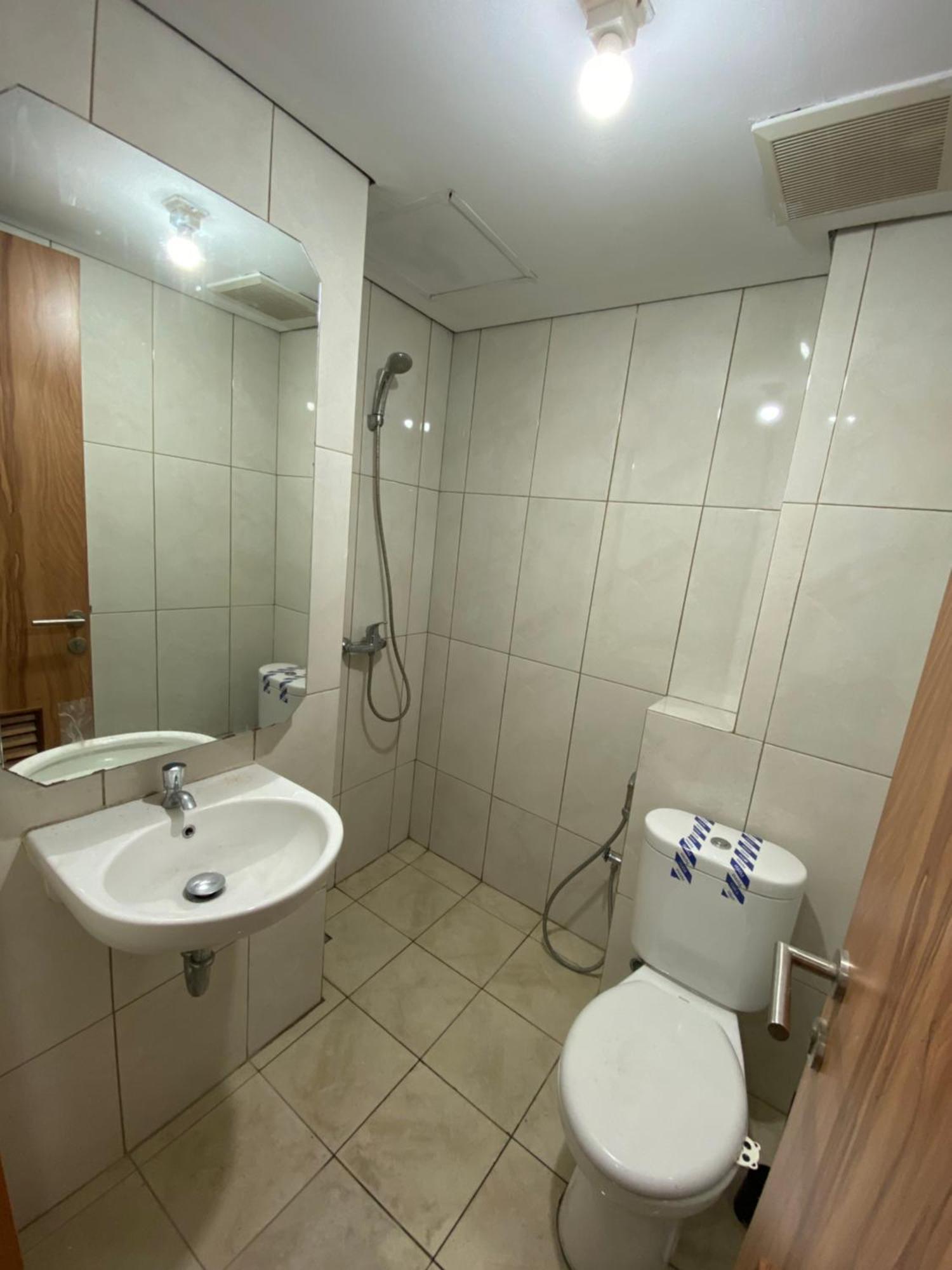 Apartment Minimalist At The Nest By Popobella Near Puri Indah West Jakarta