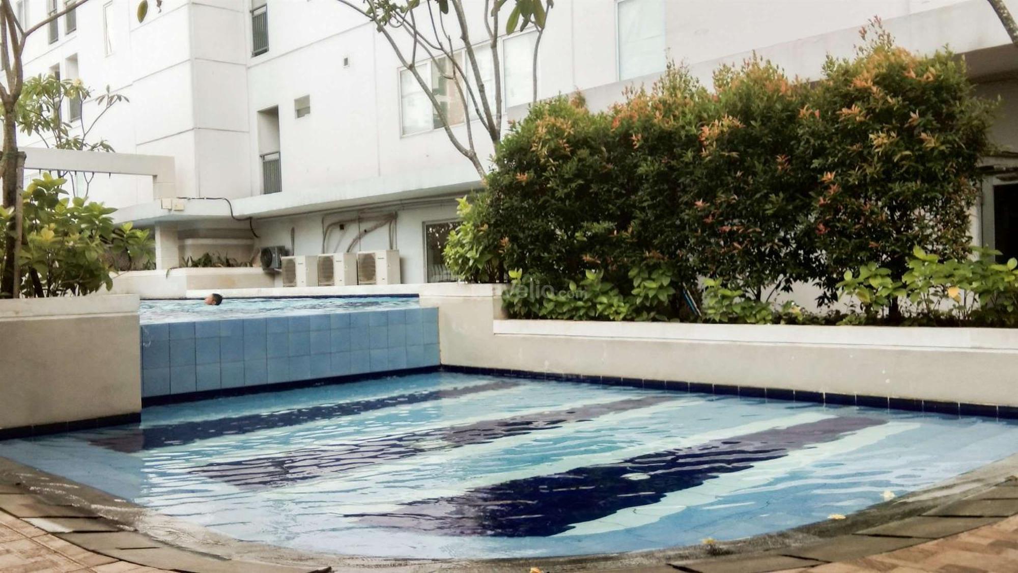 Apartment Minimalist And Warm 1br At Bassura By Travelio
