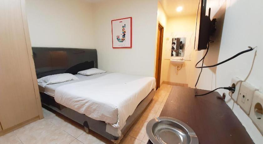 Khách sạn Taisir Near Palmerah Mitra Reddoorz Jakarta