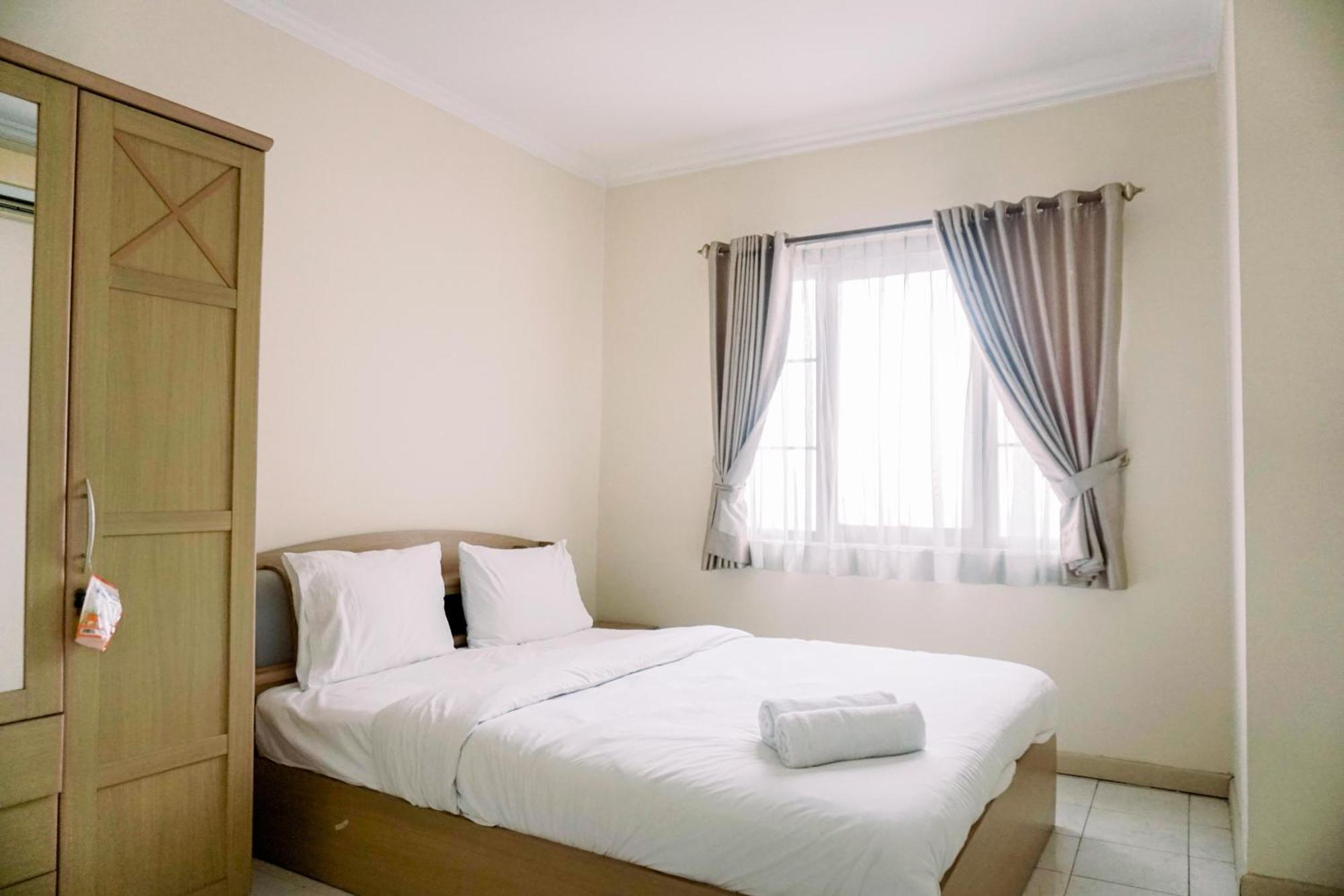 Elegant And Comfortable 2br Puri Garden By Travelio *