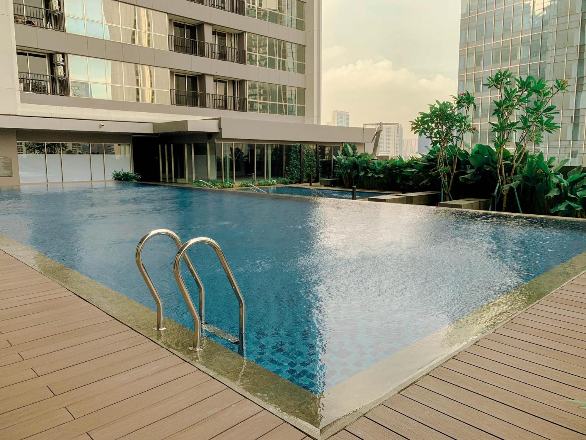 Apartment Minimalist And Homey 1br At Ciputra World 2 By Travelio