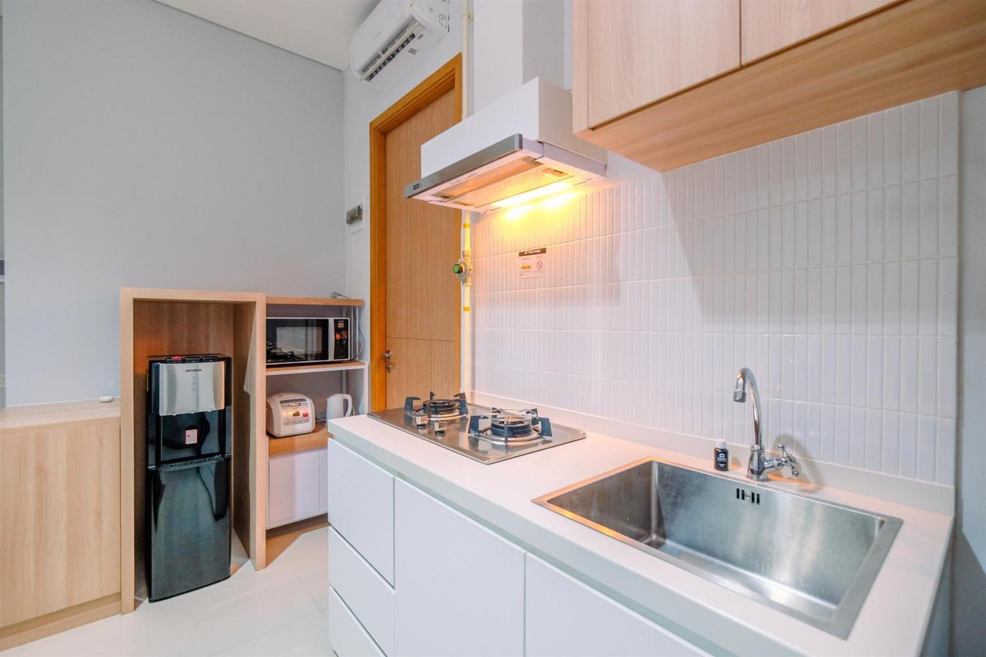 Modern And New 1br Across Lrt Station Samara By Travelio Apartment Jakarta